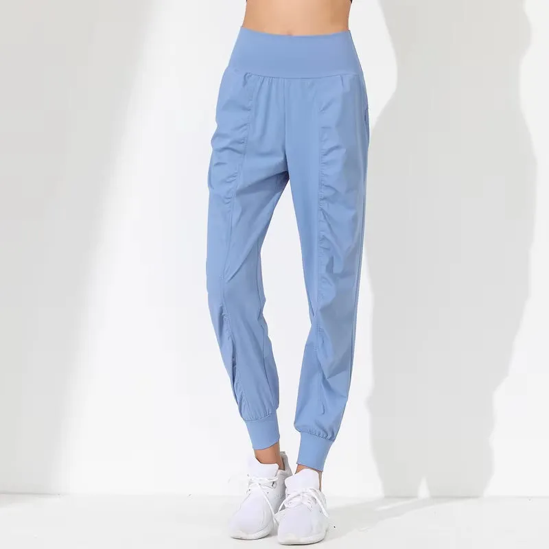 Women's Loose-Fit Yoga Pants - Slim Quick-Dry Capris with Pleated Hem, Pockets & Bound Design for Running, Fitness & Jogging