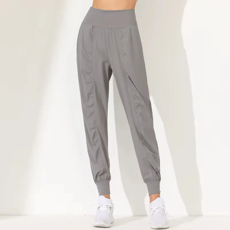 Women's Loose-Fit Yoga Pants - Slim Quick-Dry Capris with Pleated Hem, Pockets & Bound Design for Running, Fitness & Jogging